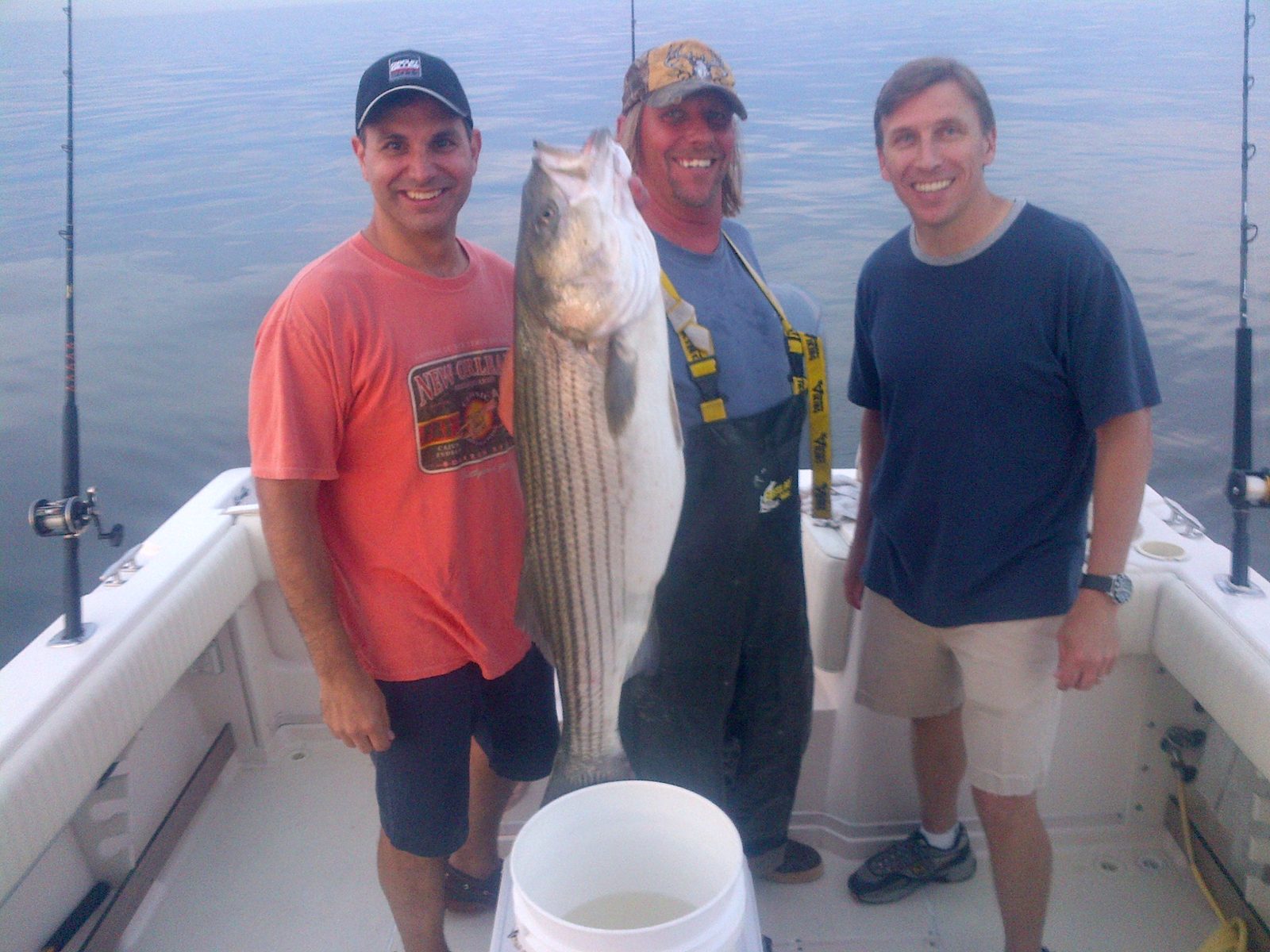 Striped bass and tackle on deck