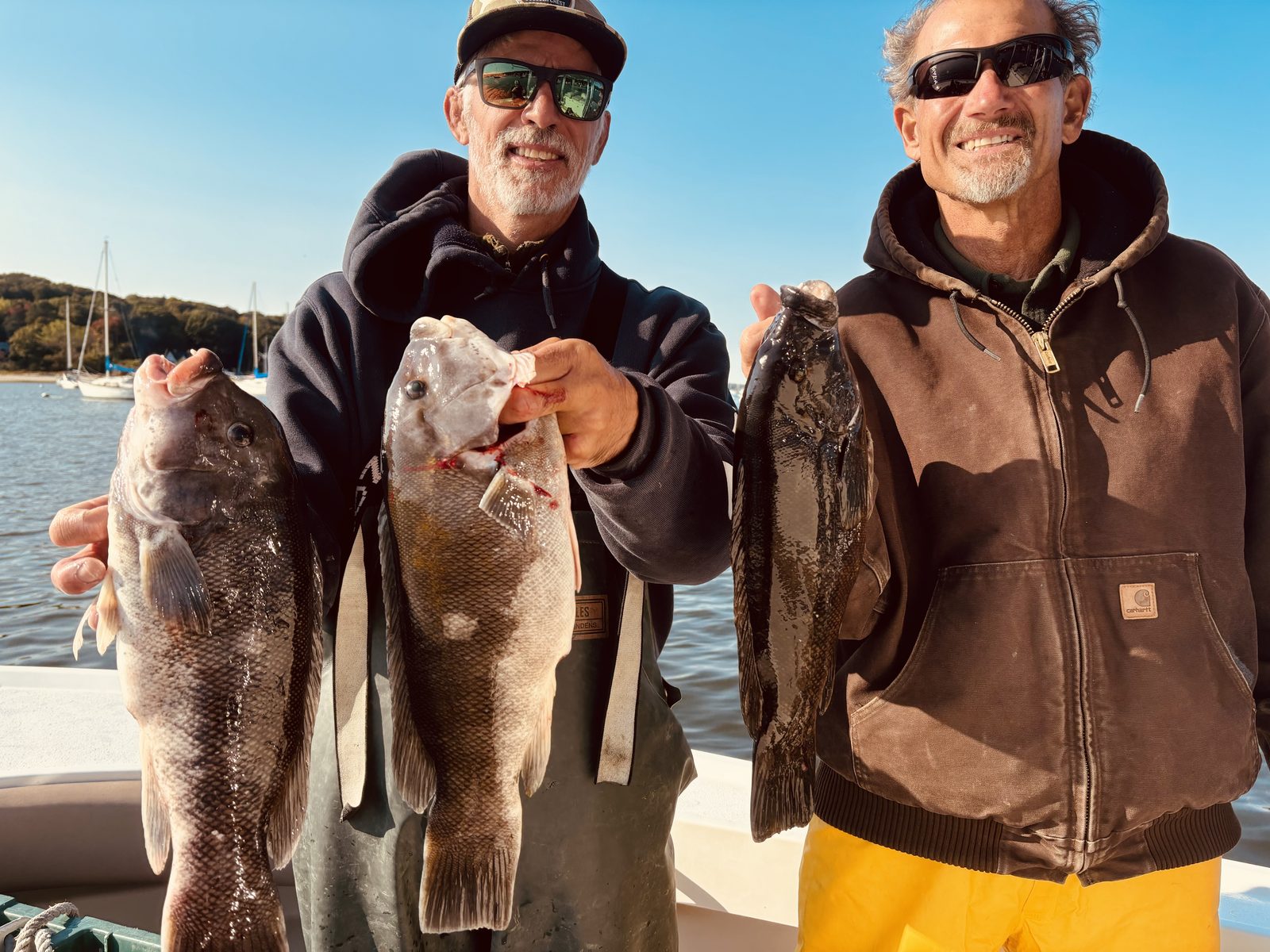 Two anglers with blackfish