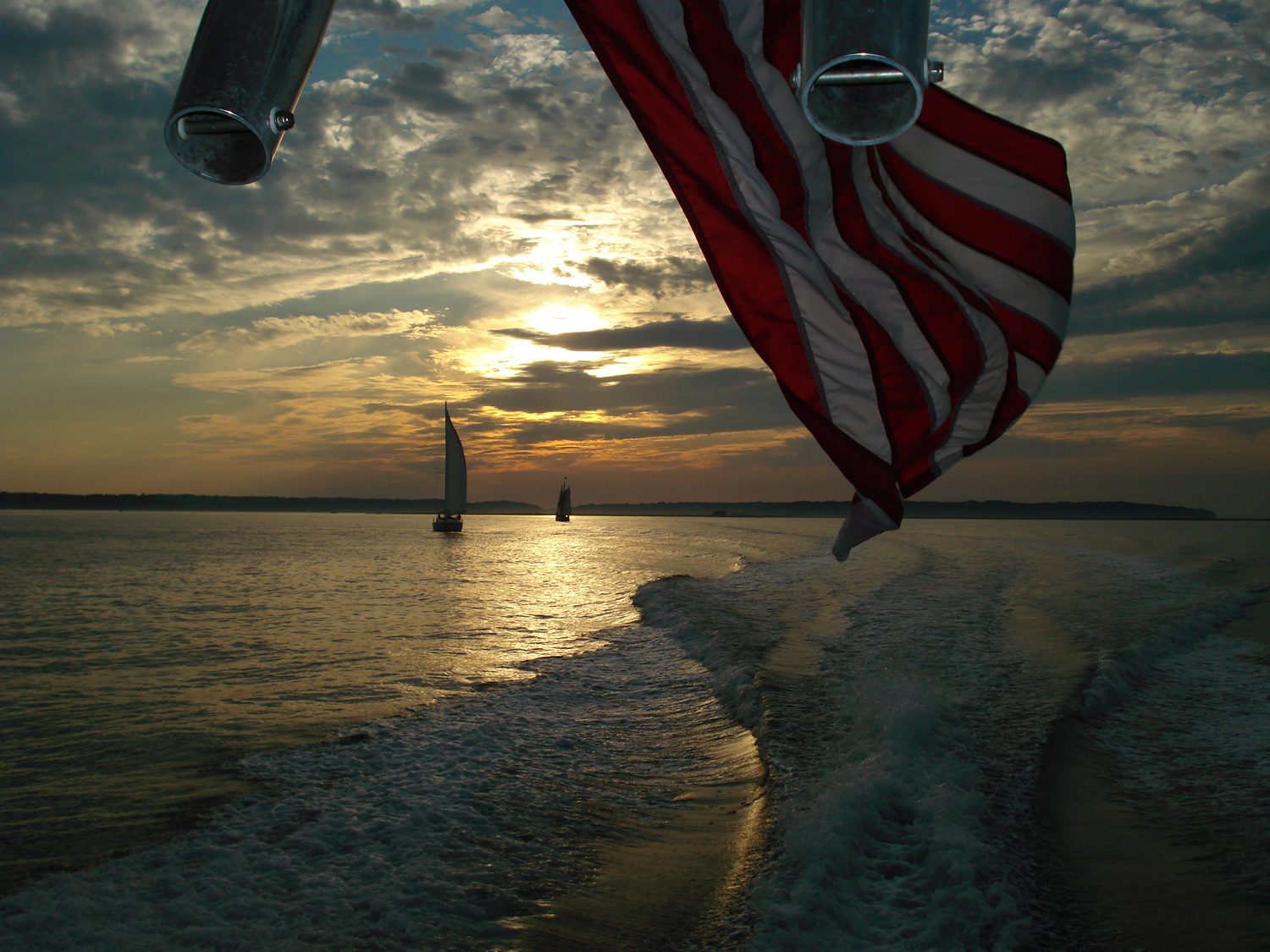 The ensign flying at sunset on Long Island Sound