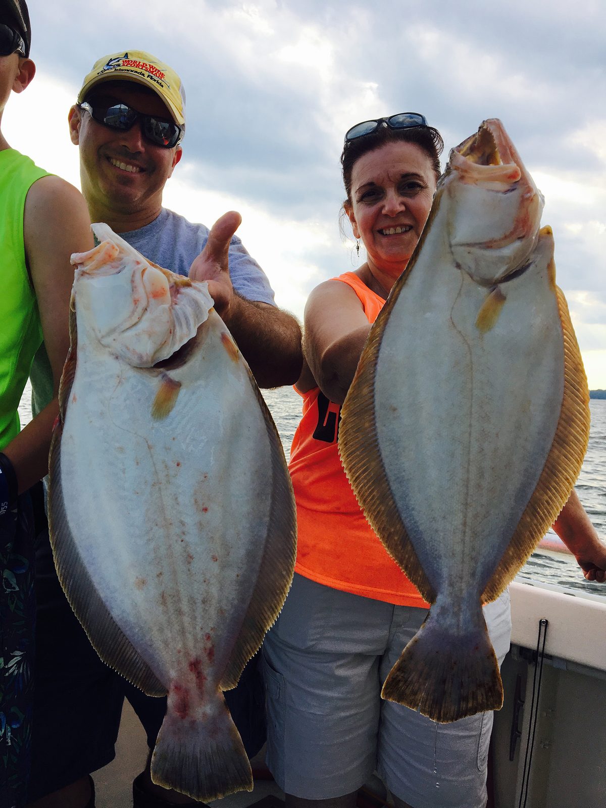 Two doormat fluke caught on a spring charter