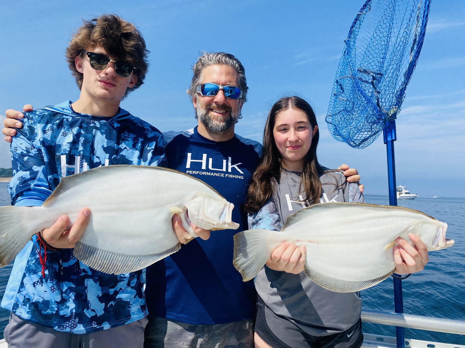 Three guests with two fluke