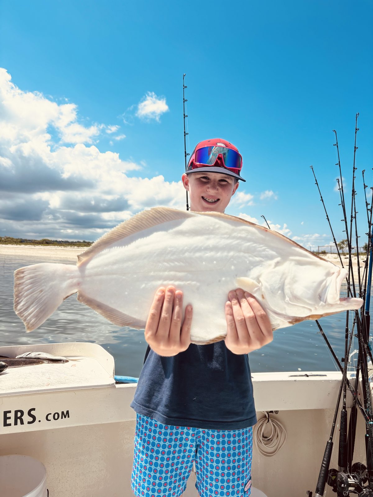 A young angler with a fluke