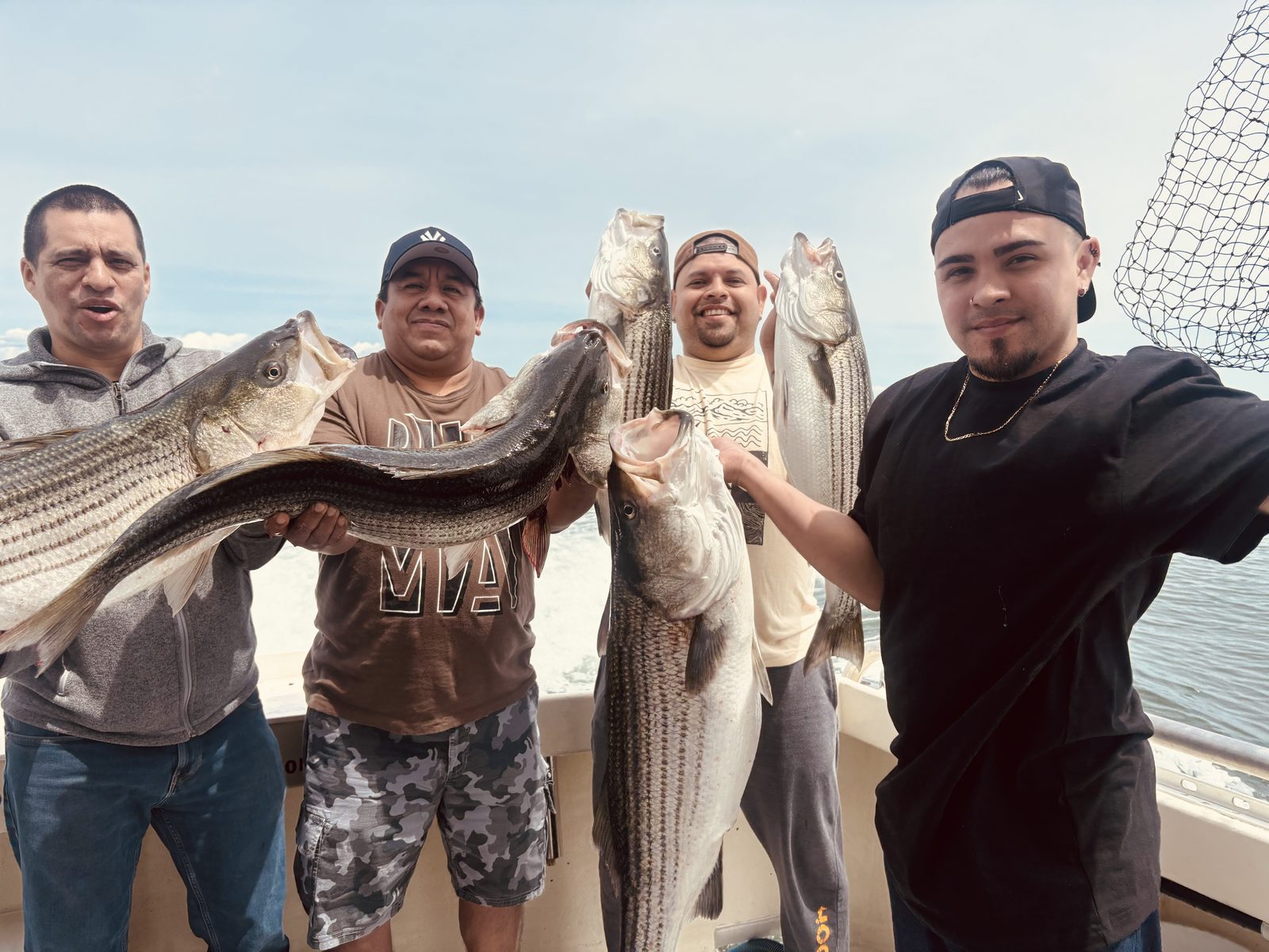A charter party with their striped bass