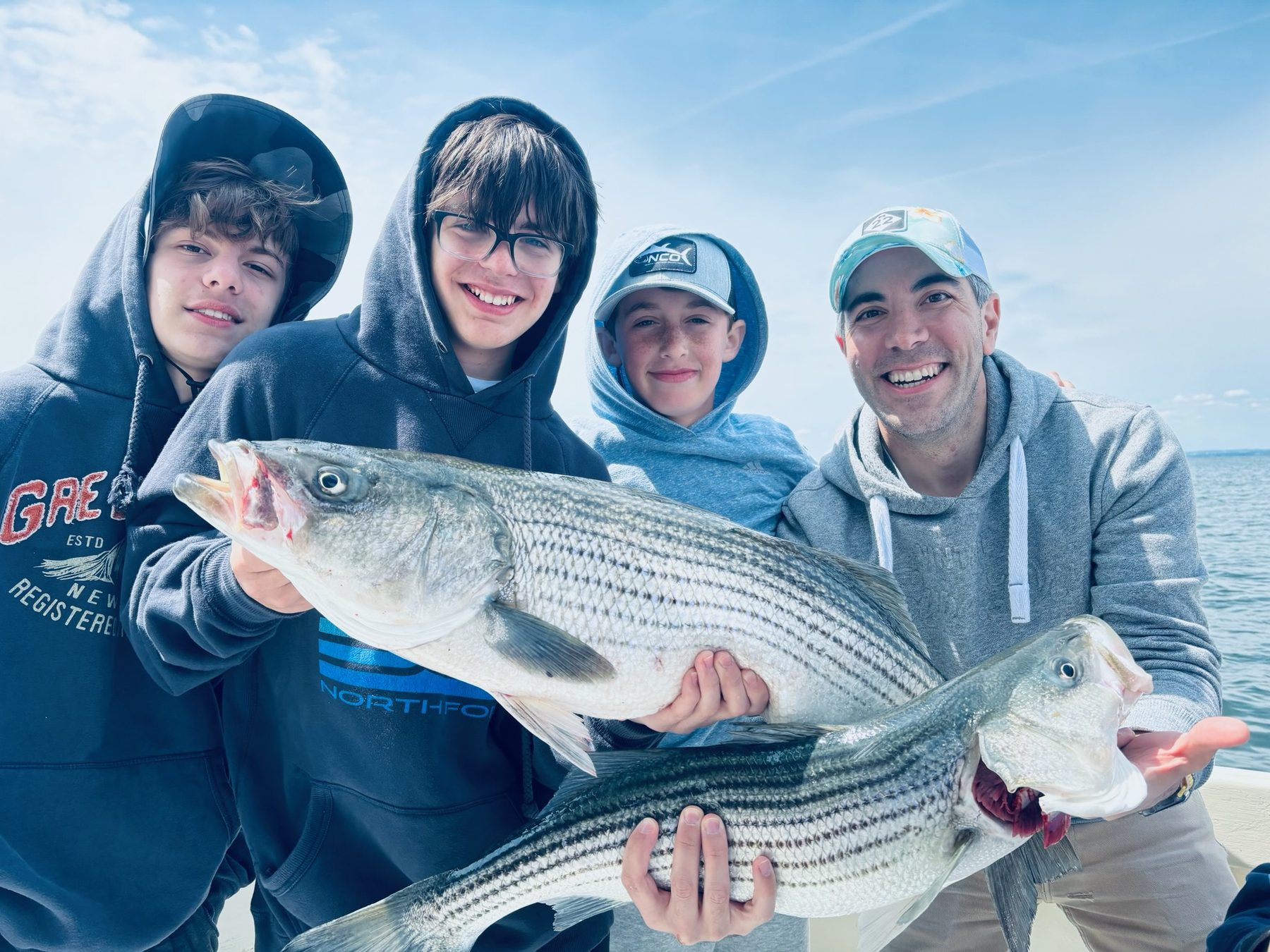 A charter group with their striped bass